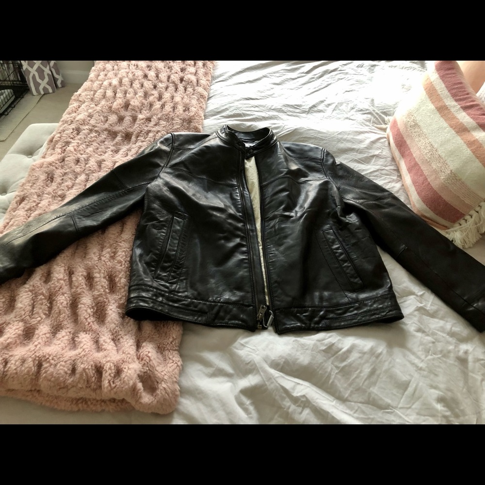 Brand new (a tag still on it) men’s leather coat.
